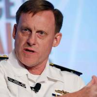 National Security Agency Director Admiral Michael Rogers participates in a session at the Intelligence and National Security Summit in Washington on Sept. 8. Senior U.S. officials recommend removal of NSA director: sources