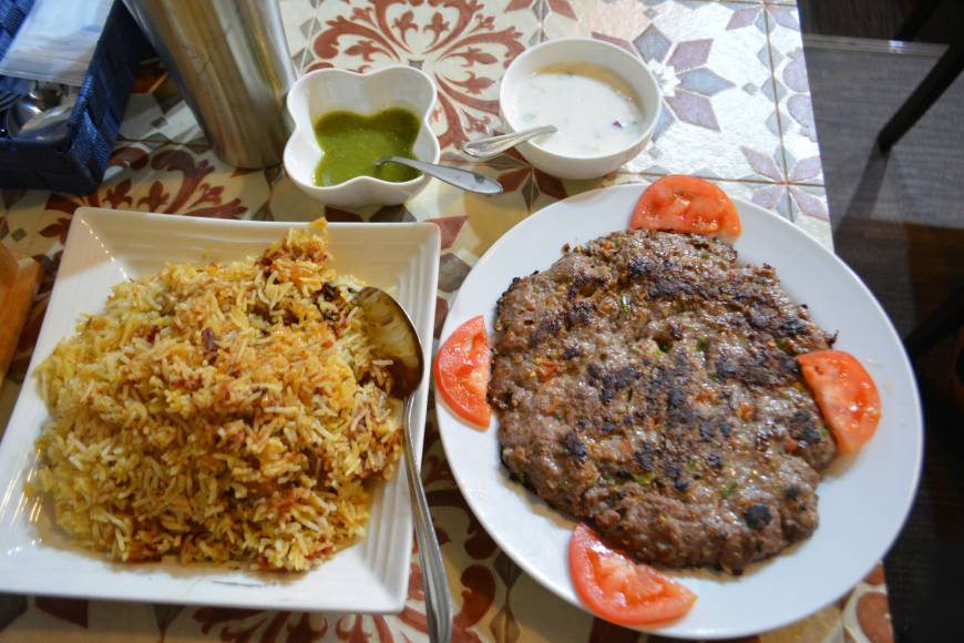 Ali’s Kitchen Mutton biryani rice and chapli kebab | J.J. O'DONOGHUE