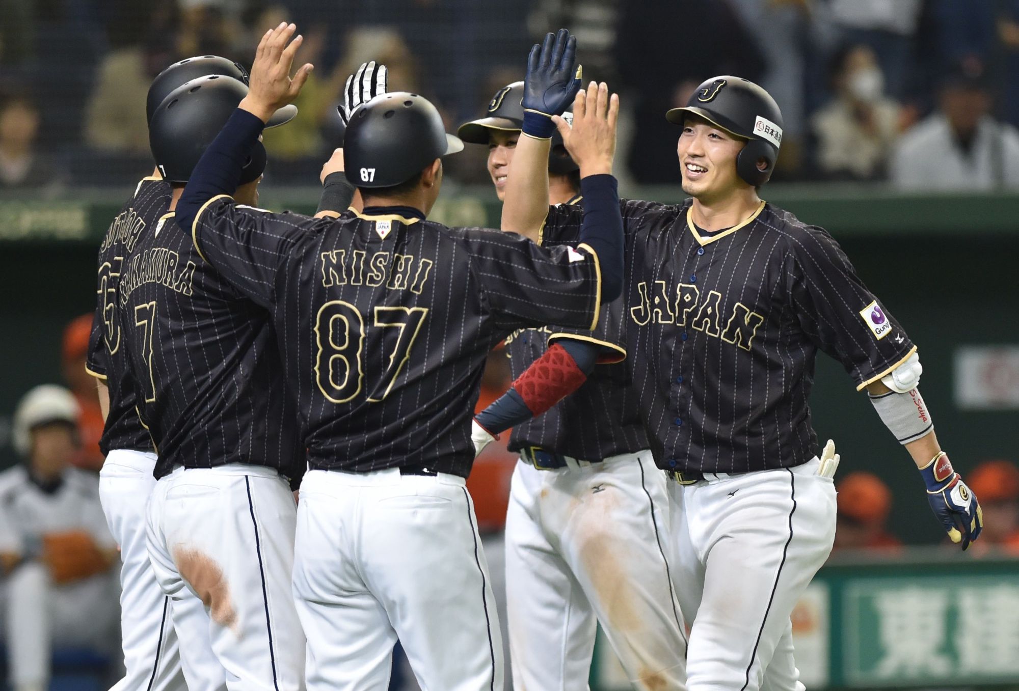 Suzuki sends Japan to victory with 10th-inning grand slam - The