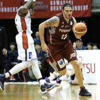 Kawasaki Brave Thunders forward Ryan Spangler dribbles the ball during a recent B. League game against the Yokohama B-Corsairs at Todoroki Arena. Kawasaki's Spangler adapting to B. League