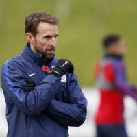 England interim manager Gareth Southgate leads his team against Scotland on Friday. Southgate all but confirmed as new England manager