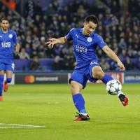 Leicester’s Shinji Okazaki shoots during the Foxes’ victory over Club Brugge during their Champions League match on Tuesday in Leicester, England. Okazaki leads Leicester into last 16