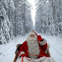 Santa Claus rides in his sleigh on Dec. 15 as he prepares for Christmas in the Arctic Circle near Rovaniemi, Finland. Temperatures around North Pole leap close to melting point