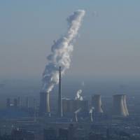 A power plant is seen on the outskirts of Beijing on Friday. China's name-and-shame campaign fails to deter polluters