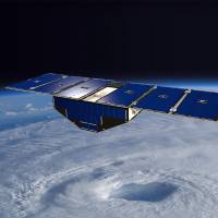 An illustration of one of the eight Cyclone Global Navigation Satellite System satellites deployed above a hurricane. Launch of mini-satellites gives forecasters eye into hurricanes