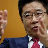 Katsunobu Kato, minister in charge of labor market reform, is interviewed in Tokyo on Dec. 19. Labor market reform chief targets pay gap as balm for productivity, spending woes