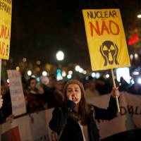 Activists protest the Spanish nuclear plant of Almaraz in front of the Spanish Embassy in downtown Lisbon, Jan 12. Portugal protests Spain's stockpiling of nuke waste near border
