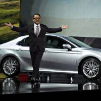 Akio Toyoda, president of Toyota Motor Corp., speaks at the 2017 North American International Auto Show in Detroit on Jan. 9. Toyota surrenders sales crown to VW as threat of trade barrier looms
