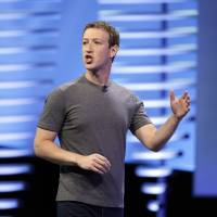 Facebook CEO Mark Zuckerberg delivers the keynote address last April at the F8 Facebook Developer Conference in San Francisco. Zuckerberg went to court to gain ownership of isolated pockets of land tucked away within his sprawling estate in Hawaii. Many of the more than a dozen parcels on Kauai are less than an acre. Zuckerberg wrote in a Facebook post Thursday that he filed the cases to find all the partial owners so he can pay them their fair share. Facebook's Zuckerberg suing to gain rights to Kauai hideaway over undocumented heirs