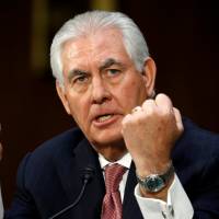Rex Tillerson, the former chairman and chief executive officer of Exxon Mobil, testifies during a Senate Foreign Relations Committee confirmation hearing to become U.S. secretary of state on Capitol Hill in Washington Wednesday. In Senate hearing, Tillerson veers away from president-elect in statements about Russia, NATO