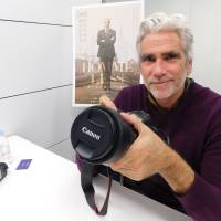 Mark Reay holds the camera that Thomas Wirthensohn used to film him in the documentary “Homme Less.” The unglamorous side to a model lifestyle