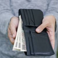 Keep it in your wallet: After a year filled with unexpected events, many in Japan have decided saving for a rainy day may be the smarter thing to do rather than making the kinds of big purchases that might help the economy. In uncertain times, Japan opts to save