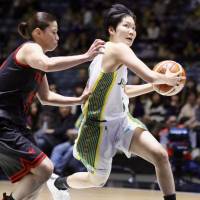 Sunflowers rookie guard Manami Fujioka drives in against the Antelopes in the annual All-Japan Championship semifinals at Yoyogi National Gymnasium on Saturday. JX-Eneos defeated Toyota Motors 72-52. Sunflowers pound Antelopes in All-Japan Championship semifinals