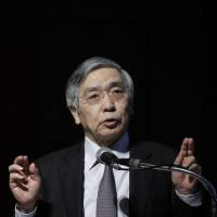 BOJ Gov. Haruhiko Kuroda speaks at a conference in Tokyo on Thursday. Bank of Japan's Kuroda warns low rates may sow seeds of new financial crisis