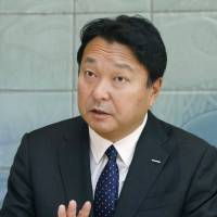 New Dentsu Inc. President Toshihiro Yamamoto is interviewed on Wednesday at the Dentsu headquarter in Tokyo. New Dentsu chief vows to improve ad giant's working conditions by 2018