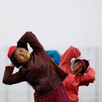 Elderly residents exercise on the island of Yeonpyeong, which lies in the Yellow Sea, South Korea, in 2014. Women's life expectancy may hit 90 by 2030 in some developed nations but U.S. lags amid health care woes