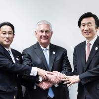 Top envoys (from left) Foreign Minister Fumio Kishida, U.S. Secretary of State Rex Tillerson and South Korean Foreign Minister Yun Byung-se meet Thursday in Bonn, Germany. U.S., Japan, South Korea envoys condemn North Korea missile test, plan to discuss common threat