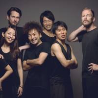 Roles call: CITA members and founder James Sutherland (right). CITA 'usher' points to need for a Japan theater shakeup
