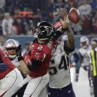 The Falcons’ Matt Ryan fumbles after being hit by Dont’a Hightower during the second half on Sunday. Ryan, Quinn reflect on agonizing defeat