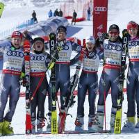 (From left) France’s Julien Lizeroux, Tessa Worley, Alexis Pinturault, Adeline Baud Mugnier, Mathieu Faivre and Nastasia Noens celebrate winning gold after the final of the parallel slalom mixed team event at the world championships on Tuesday in St. Moritz, Switzerland. France claims team title at skiing worlds