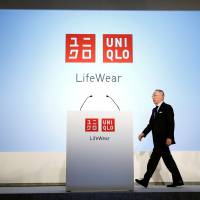 Tadashi Yanai, chairman and chief executive officer of Fast Retailing Co., attends a news conference to mark the unveiling of the company’s new headquarters in Tokyo on Thursday. Uniqlo eyes speed to take on Zara for global crown