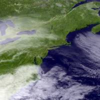 This satellite image taken around 3:11 p.m. EDT and released by the National Oceanic and Atmospheric Administration, shows clouds around the Northeast of the United States Monday. A powerful nor’easter could bring blizzard conditions and more than a foot of snow from the mid-Atlantic to parts of the Northeast, and officials warn of potential beach erosion, possible coastal flooding and power outages from the late-season snowstorm. Major blizzard threatens Northeast, DC cherry blossoms, forces thousands of canceled flights