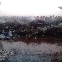 A picture taken on Mondayin South Sudan’s northwestern city of Wau shows people gathering near a crashed jetlier that left at least 37 people injured, government and airport officials said. Jetliner with 45 aboard crashes, burns on landing in Juba; at least 14 hurt