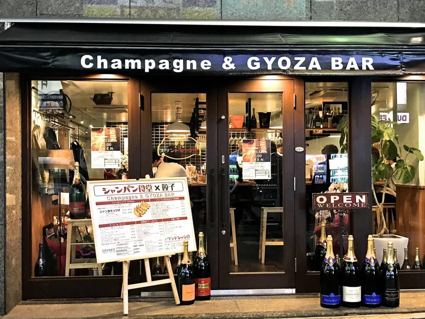 Champagne & Gyoza Bar East is east and west is west and ever the twain shall meet: The front of Champagne & Gyoza Bar tempts passersby to sample its wares. | ROBBIE SWINNERTON
