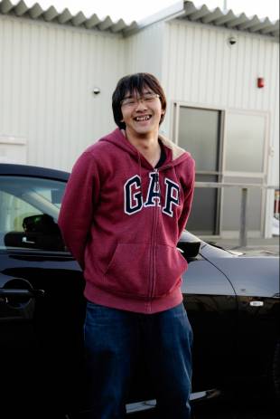 A resident of a temporary housing facility in Minamisoma, Fukushima Prefecture, poses for a photograph in December 2016.