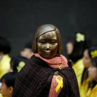 A statue symbolizing former South Korean “comfort women” is seen during an anti-Japan rally on the 98th anniversary of Independence Movement Day in Seoul on March 1. Why is Japan's public diplomacy so utterly inept?