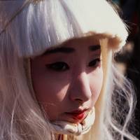 The city personified: A young woman takes part in the annual heron dance, a traditional event in Tokyo’s Asakusa area. 'Tokyo: A Biography': Tracing the life of a city