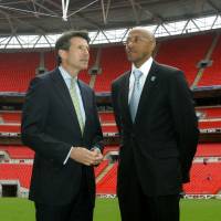 IOC member Frankie Fredericks (right), seen here with IAAF president Sebastian Coe in 2008, is denying any wrongdoing over payments related to the awarding of the 2016 Rio Games. IOC to probe payments on voting for Rio Games