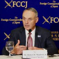 MLB commissioner Rob Manfred speaks at the Foreign Correspondents’ Club of Japan on Tuesday. MLB players for 2020 Games unlikely