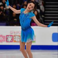 Russia’s Evgenia Medvedeva performs in the short program at the world championships in Helsinki on Wednesday night. Medvedeva leads entering Friday’s free skate. Medvedeva leads as Japan trio struggles