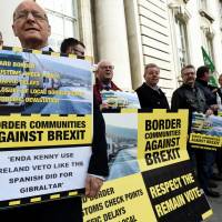 Anti-Brexit campaigners protest outside Irish Government buildings in Dublin, Ireland on Tuesday. Brexit to dominate as May sets out plans for U.K. re-election