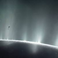 NASA’s Cassini spacecraft is shown diving through the plume of Saturn’s moon Enceladus, in 2015, in this photo illustration. NASA: Saturn moon Enceladus has necessary conditions to harbor life