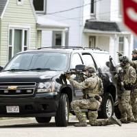 FBI agents provide tactical support to sheriff’s detectives during a search Thursday for Joseph Jakubowski, in Janesville, Wisconsin. A manhunt was underway Friday for Jakubowski, suspected of stealing firearms from a southern Wisconsin gun store, threatening an unspecified attack that prompted several schools to close, and sending an anti-government manifesto to President Donald Trump. Manhunt launched for 'highly dangerous' gun shop robber who wrote manifesto to Trump