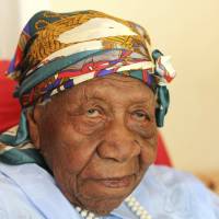 Violet Brown, at 117 believed to be the world’s oldest person, poses for a photo at her home in Duanvale, Jamaica, on Sunday. 117-year-old Jamaican woman likely the oldest person in the world