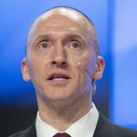 Carter Page, a former foreign policy adviser of then-U.S. President-elect Donald Trump, speaks at a news conference at RIA Novosti news agency in Moscow in December. A published report Tuesday says the FBI obtained a court order to monitor communications of Page last summer. FBI reportedly monitored Trump adviser Page last summer over Russia connection