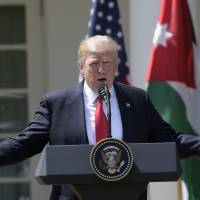 President Donald Trump speaks during a news conference with Jordan’s King Abdullah II in the Rose Garden of the White House in Washington Wednesday. Trump says Obama adviser Rice may have committed crime, vows to explain 'at the right time'