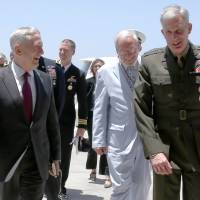 U.S. Defense Secretary James Mattis (left) is greeted by U.S. Marine Corps Gen. Thomas Waldhauser (right) after arriving at Camp Lemonnier in Djibouti on Sunday. U.S. Defense Secretary Mattis makes visit to strategic Djibouti