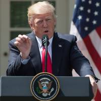 U.S. President Donald Trump speaks at a press conference in the Rose Garden at the White House in Washington Wednesday. Abe, Trump huddle over North Korea missile threat, want Beijing to pressure Pyongyang further