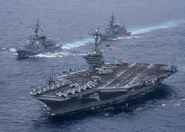 Japanese fighter jets conduct joint drill with U.S. carrier off Okinawa