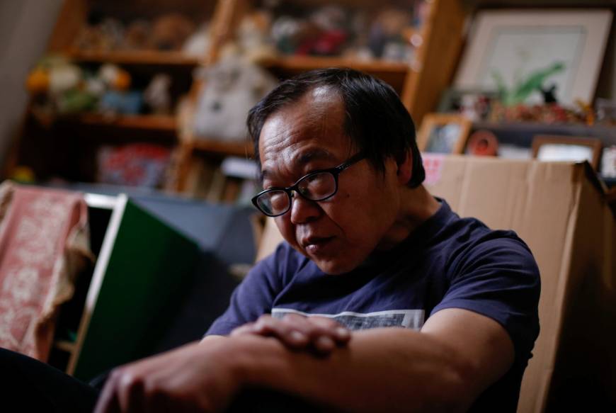 Akihiro Karube, 53, who was diagnosed with Parkinson