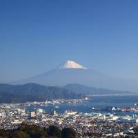 Mount Fuji is seen from Shizuoka city. Shizuoka flagged as first major city to see population drop below 700,000