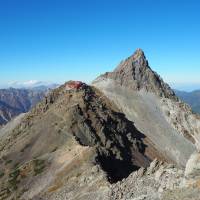 Breathless: The 3,180-meter peak of Mount Yari keeps watch over its mountain hut near Kamikochi, Nagano Prefecture. Effort and reward: Hiking the precipitous spine of central Honshu