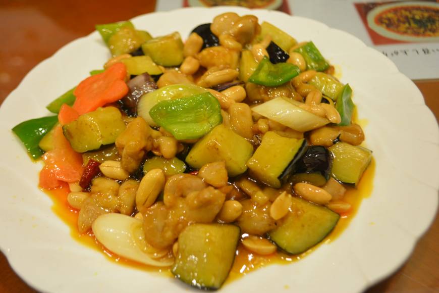 Soryuko Saucy: Spicy chicken thigh, peanuts and aubergine stir fry at Soryuko. | J.J. O'DONOGHUE