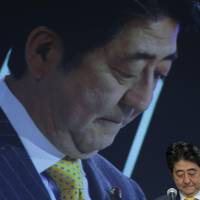 Sad: Could the policies of Prime Minister Shinzo Abe have something to do with why so many Japanese report feeling so unhappy? What conspires to make Japanese seem so unhappy?