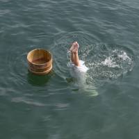 Perfect form: After taking a huge breath, an ama diver executes a vertical dive in Toba, Ise-Shima, Mie Prefecture. Home of the cultured pearl, Toba in Ise-Shima has both history and living tradition