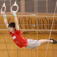 Kohei Uchimura works the rings during his practice on Wednesday at the National Training Center. 'King Kohei' making adjustments with new scoring system